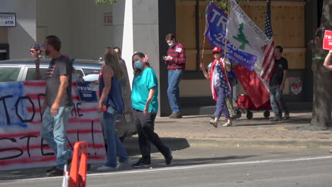 Trump-supporters-carry-signs-and-march-in-protest-of-2020-US-Presidential-election-results-in-Austin,-TX