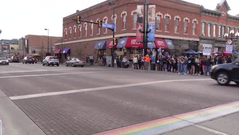 People-celebrating-Joe-Biden's-election-victory-in-the-streets-of-Boulder,-Colorado