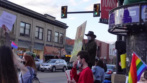 People-celebrating-Joe-Biden's-election-victory-in-the-streets-of-Boulder,-Colorado