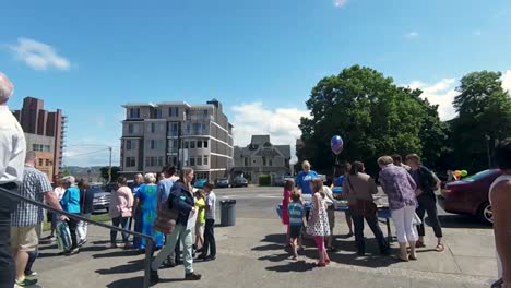 Crowd-Of-People-Going-Out-Of-The-Church-On-A-Sunny-Sunday-Morning---timelapse,-wide-shot