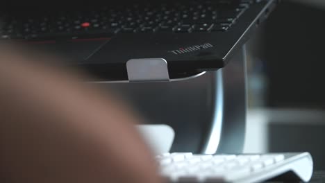 Man-working-from-home-on-a-laptop-during-the-global-Coronavirus-pandemic