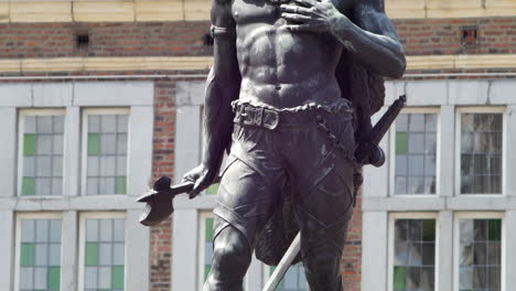 Ambiorix-Bronze-Statue-at-Market-Square-Tongeren,-Tilt-Up-Reveal
