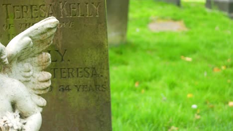 panning-shot-of-cemetery-statue