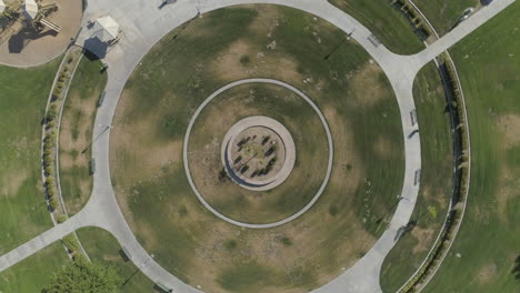AERIAL---Spiral-Drone-Shot-of-Suburban-Park-Centerpiece