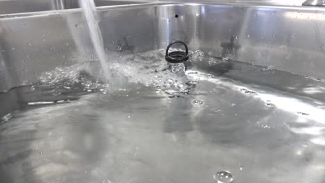 A-washbasin-is-filled-with-clear-water
