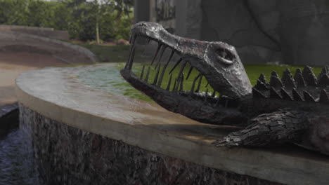 A-statue-of-a-crocodile-near-the-pool