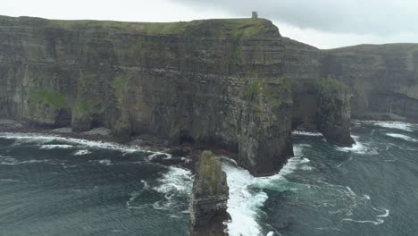 Aerial-turning-shot-of-epic-thrilling-lanscape-coastline-cliffs-at-cliffs-of-moher-ireland