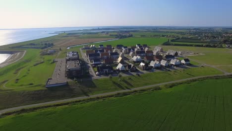 Aerial-shots-of-a-new-neighborhood-near-the-sea-in-Kruiningen,-the-Netherlands