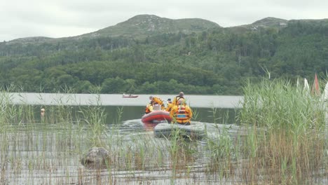 Irish-Civil-Defence-reversing-small-dinghy's-out-onto-lake-during-sailing-regatta