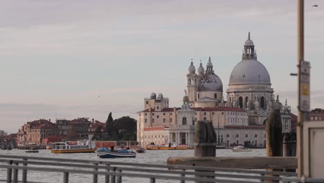 traffic-of-boats-and-ferries-on-the-grand-canal-of-Venice-with-historical-building-in-background