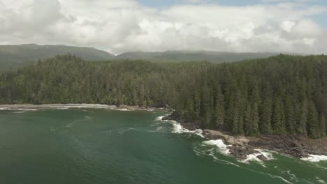 Beautiful-Aerial-Panoramic-Landscape-View-of-the-Rocky-Pacific-Ocean-Coast-in-the-Southern-Vancouver-Island-during-a-sunny-summer-day