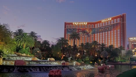 Rocks-and-cascade-outside-the-Mirage-resort-at-Las-Vegas-with-the-Treasure-Island-as-a-background