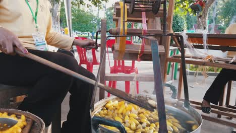 Artisan-Lady-Extracting-Silk-From-Silkworm-Cocoons