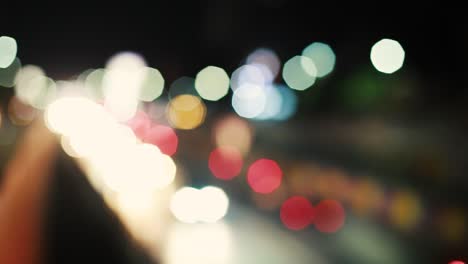Abstract-nighttime-bokeh-traffic,-a-celebration-of-the-festival-collection