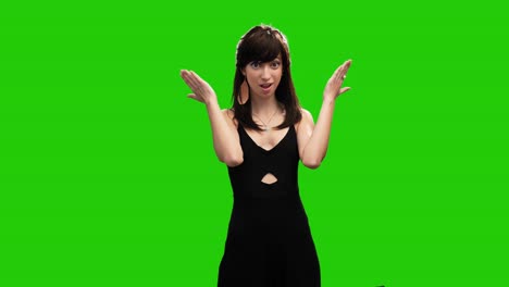 Portrait-of-adorable-slim-woman-surprised-on-green-screen