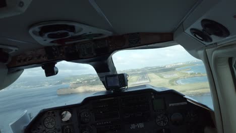 Cockpit-view-of-a-bn2-islander-landing-at-the-airstrip-on-the-Caribbean-island-of-Grenada