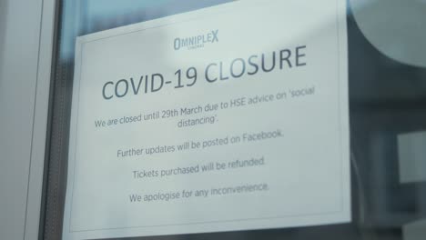 COVID-19-closed-business-sign-in-window-Ireland
