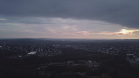 Time-lapse-shot-of-small-town-at-sunset