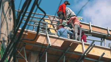 Asian-Male-and-Female-Workers-Working-On-a-Construction-Project-in-Cambodia