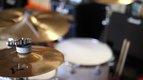 A-professional-drum-set-in-a-garage-band-with-Zildjian-cymbals,-hi-hat,-tom-and-snare