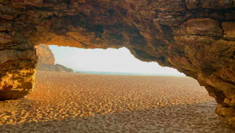 Cave-on-the-northern-beach-Nazare,-Portugal