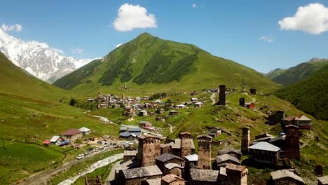 Old-Village-Landscape-Of-Ushguli-With-Medival-Stone-Tower-House-Buildings-in-Caucasus-Nature-Mountains,-Rivers-and-Valleys-In-North-East-Of-Europe-In-Mestia-Svaneti-Georgia,-Historical-Architecture