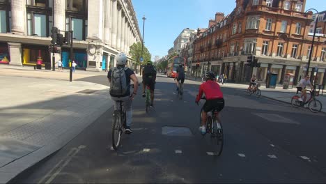 Cyclists-Going-Down-Oxford-Street-During-Lockdown-In-London