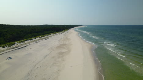 Aerial-view-of-empty-beach-on-the-Baltic-Sea-shoreline