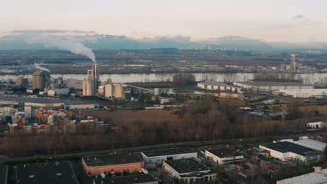 Aerial-drone-view-of-industry-along-the-Fraser-River-in-Delta,-BC,-Canada