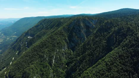Aerial-top-view,-drone-flying-away-over-impressive-forest-of-mountain-Tara-in-Serbia