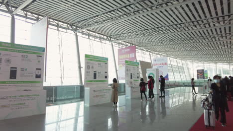 Exhibition-visitors-registering-electronically-at-the-entrance-of-health-and-beauty-exhibition-inside-Guangzhou-Canton-Fair-complex