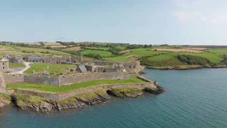An-historical-landmark-located-at-kinsale,-cork-ireland,panning-aerial-video-shows-tourists-visiting-this-star-shaped-fort-looking-out-onto-the-Atlantic-Ocean,A-hotspot-along-the-"Wild-Atlantic-Way