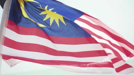 Close-Up-Shot-Of-A-Waving-And-Fluttering-National-Flag-Of-Malaysia