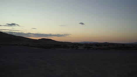Beautiful-view-from-a-car-of-a-vivid-sunset-in-the-Little-Sahara-desert-in-Central-Utah