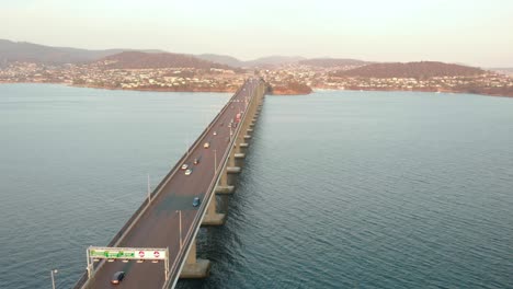 Aerial-shot-over-Tasman-bridge-highway-at-sunset