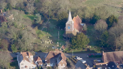 Aerial-view-of-St-Mary's-church-in-High-Halden-village,-located-in-Kent-UK