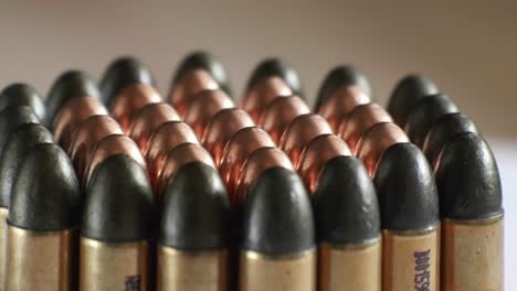 Close-up-of-many-ammunition-are-arranged-in-a-row-and-rotated-with-a-rotating-platform