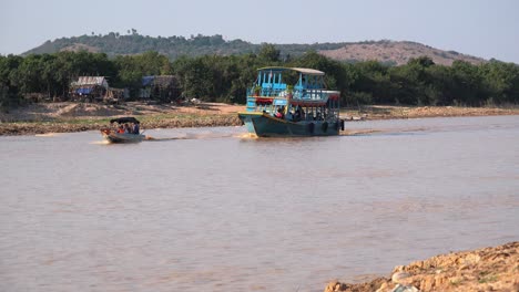 Medium-Exterior-Shot-of-Tourist-Boat-in-a-River