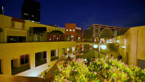 The-Famous-And-Most-Visited-Horton-Plaza-Shopping-Mall-With-Beautiful-Bright-Lights-At-Night---Aerial-Shot