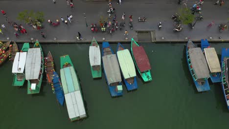 Top-down-Aerial-view-of-Hoi-An-in-Vietnam-with-boats-and-dockside