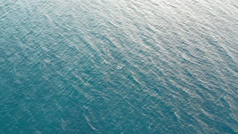 Tranquil-ocean-surface-background-footage,-gentle-waves-of-sea,-aerial