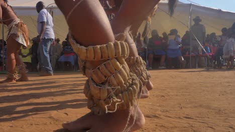 Close-up-of-Basara-men-dancing-wearing-Setswana-Traditional-Leg-Rattles