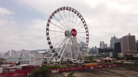 Riesenrad-Von-Hongkong-Und-Aia-Vitality-Park-Mit-Wolkenkratzern-Der-Stadt-Im-Hintergrund