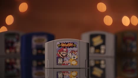 Super-Smash-Bros.-Cartridge-Im-Bild-Mit-Anderen-N64-Spielen-Im-Hintergrund