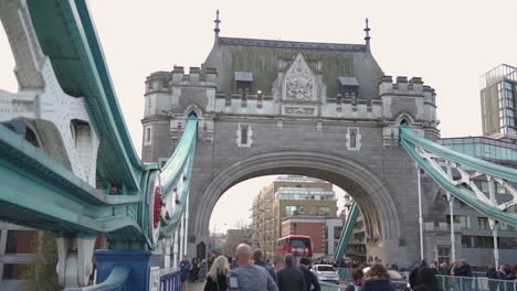 People-and-Car-Traffic-Under-Tower-Bridge-Gate,-London,-England