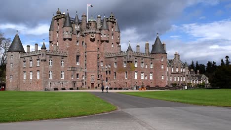 Glamis-Castle-approached-by-2-people