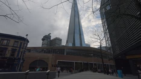 London-Bridge-Station-Entrance-With-The-Shard-Building-During-Lockdown-On-Grey-Day