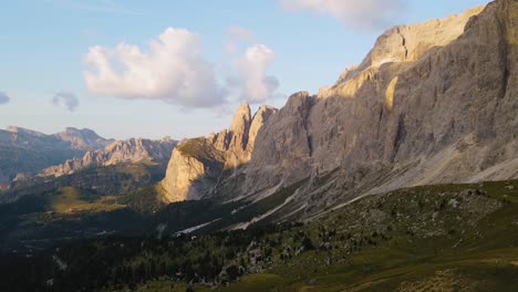 Dolomites,-Alp-Mountain-range,-cloud-shadow-on-jagged-peaks,-breathtaking-aerial