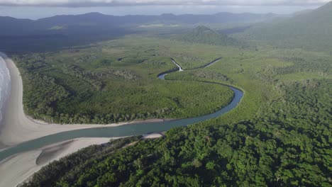 River-And-Green-Vegetation-Near-The-Thornton-Beach-With-Panorama-Of-Daintree-National-Park-In-Queensland,-Australia