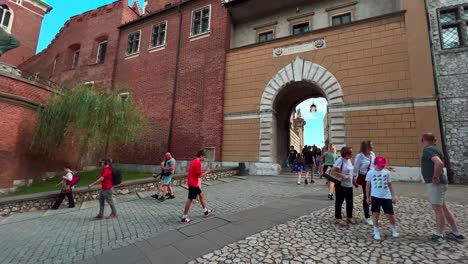 Tourist-walkin-near-Wawel-Castel-in-Krakow-Poland